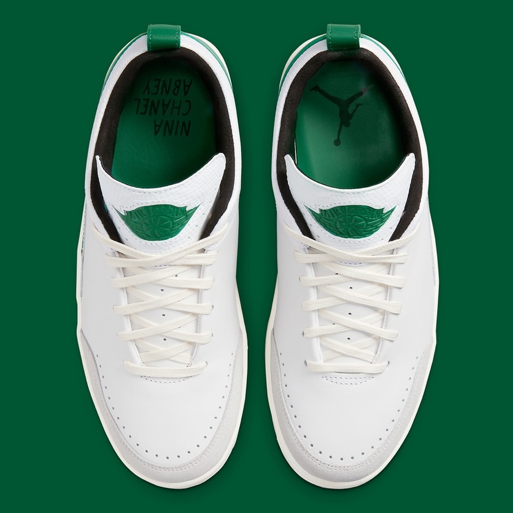 Nike Air Jordan X Nina Chanel Abney green and white sneakers.